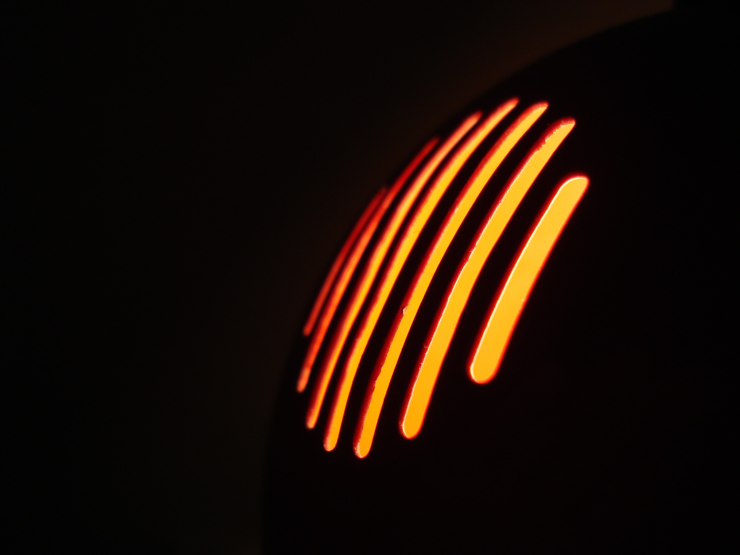 seven metalic share rods on a black background