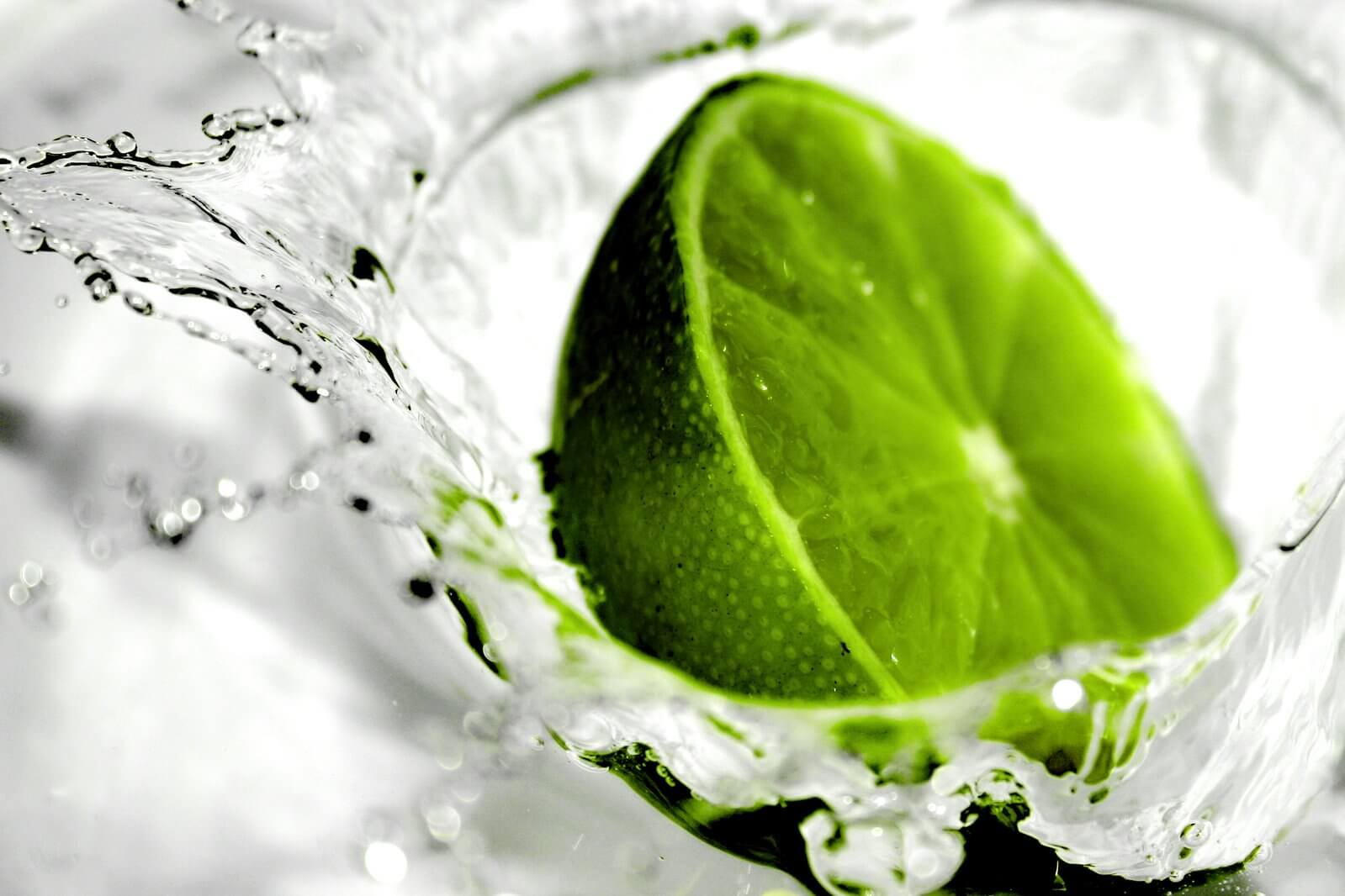 half-cut lemon in a glass with clear water